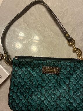 Coach Teal Patterned Wristlet with Brown Leather Trim